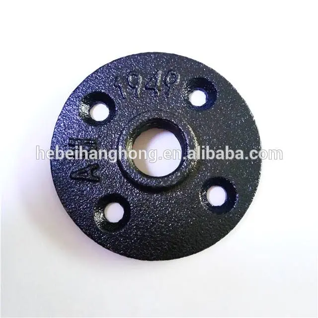 DIY black cast iron pipe fittings and wood shelves with malleable floor flange, break flange