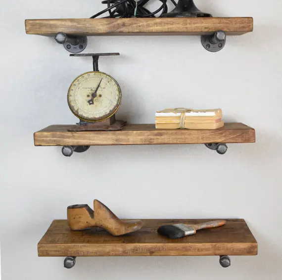black walnut shelf with cast iron pipe brackets